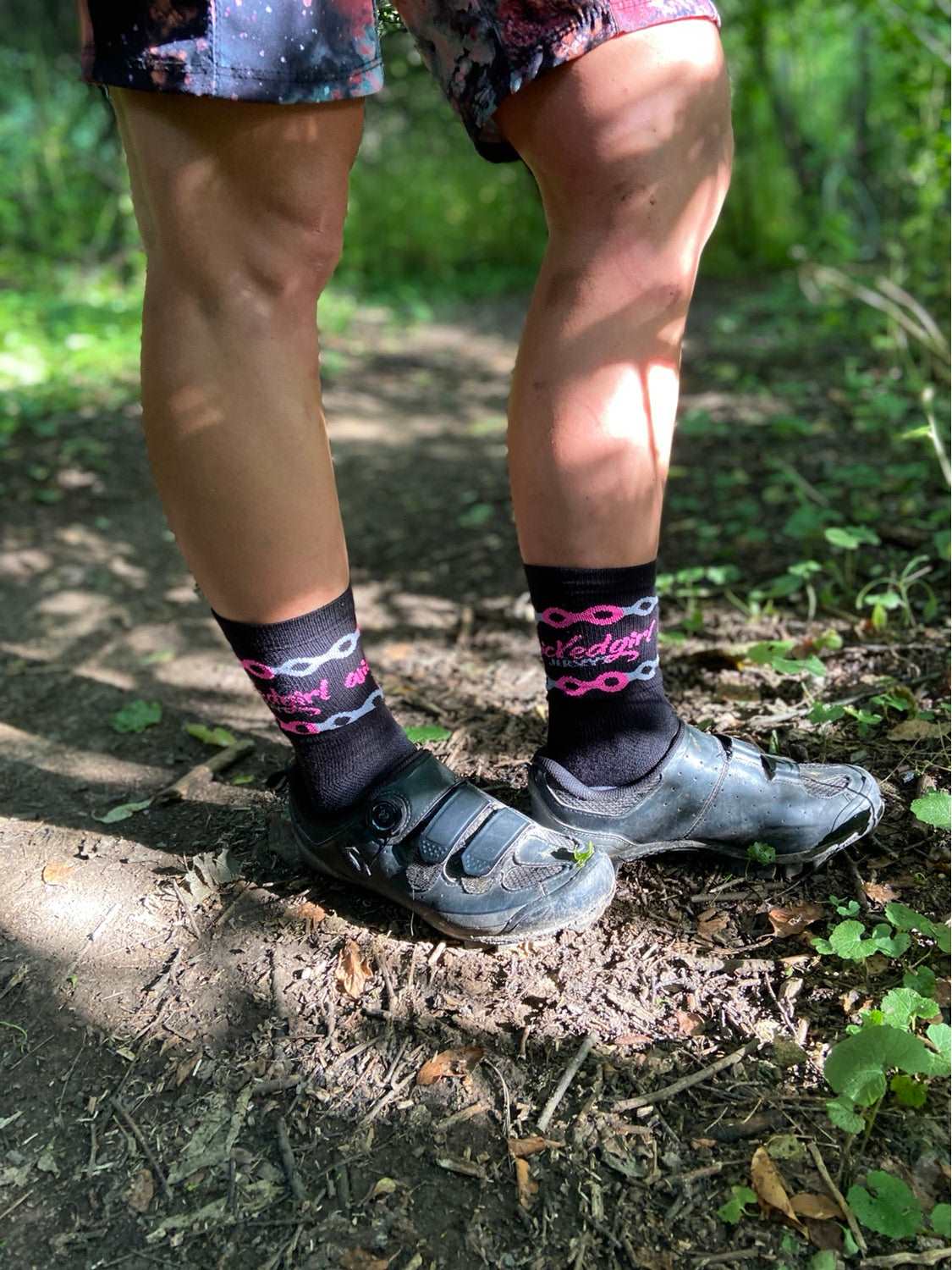 Wicked Girl Socks by Sock Guy with 6-inch cuff, moisture-wicking, in outdoor setting.